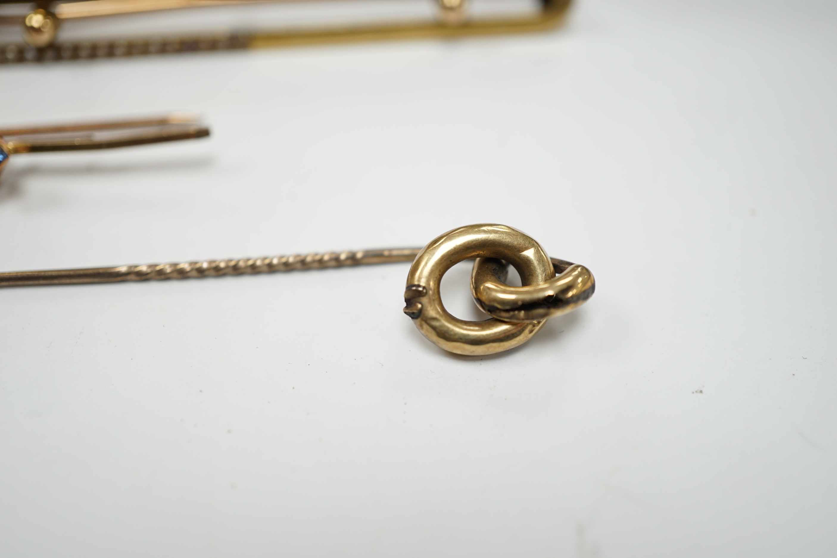 An Edwardian 15ct and seed pearl set bar brooch, 64mm, gross 4.9 grams, a 9ct bar brooch, two stick pins and a pair of 9ct and simulated pearl set drop earrings.